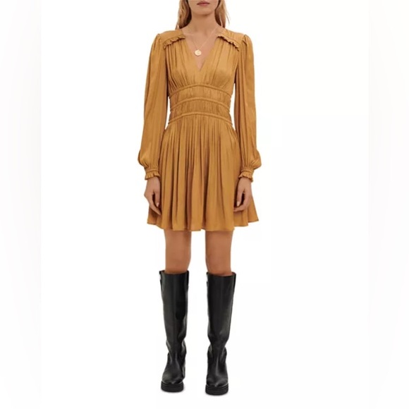 Maje Dresses & Skirts - V-neck
Long sleeves, elasticized cuffs
Wide smocked waist
Flared skirt